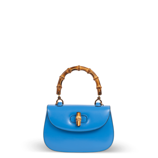 Blaue Lederhandtasche mit Bambusgriff der Marke Gucci.