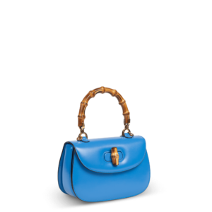 Blaue Lederhandtasche mit Bambusgriff der Marke Gucci.
