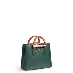 Dunkelgrüne Handtasche aus Leder mit Bambusgriffen der Marke Gucci.
